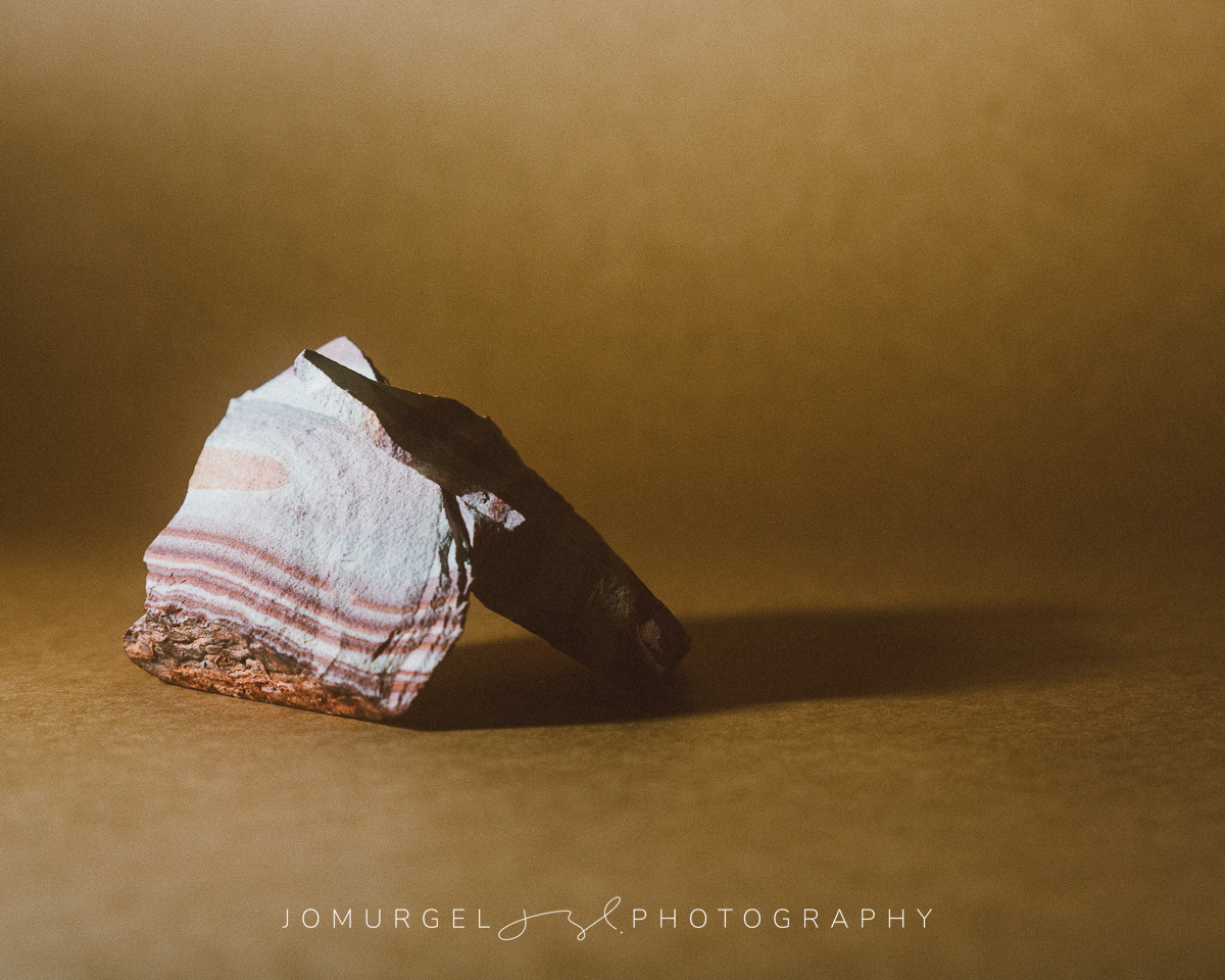 two rocks leaning against each other